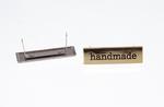 HAND MADE značka kovová 40x16mm